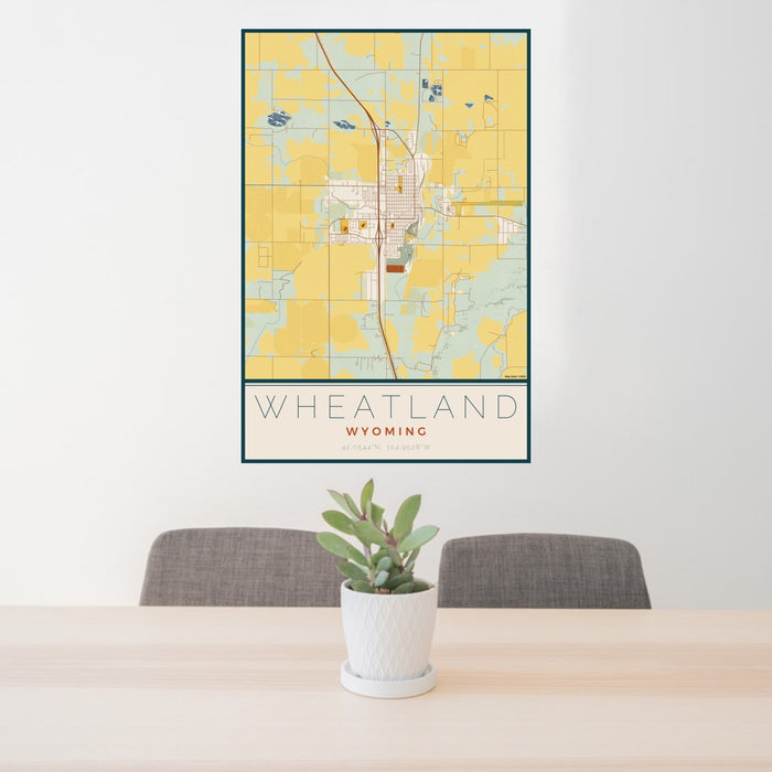 24x36 Wheatland Wyoming Map Print Portrait Orientation in Woodblock Style Behind 2 Chairs Table and Potted Plant