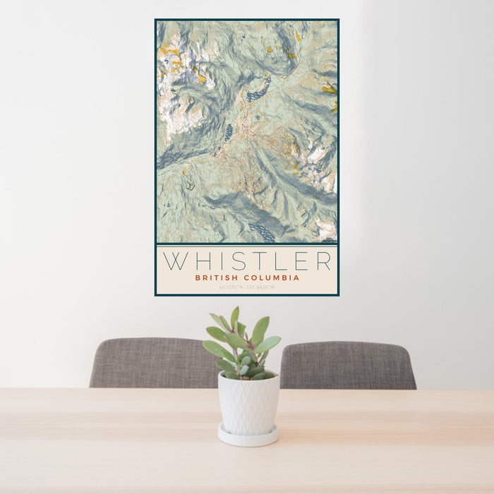 24x36 Whistler British Columbia Map Print Portrait Orientation in Woodblock Style Behind 2 Chairs Table and Potted Plant