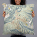 Person holding 22x22 Custom Whistler British Columbia Map Throw Pillow in Woodblock