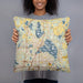 Person holding 18x18 Custom White Bear Lake Minnesota Map Throw Pillow in Woodblock