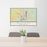 24x36 Williston North Dakota Map Print Lanscape Orientation in Woodblock Style Behind 2 Chairs Table and Potted Plant