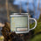 Right View Custom Williston North Dakota Map Enamel Mug in Woodblock on Grass With Trees in Background