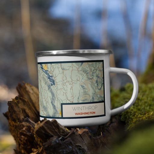 Right View Custom Winthrop Washington Map Enamel Mug in Woodblock on Grass With Trees in Background
