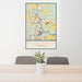 24x36 Wisconsin Dells Wisconsin Map Print Portrait Orientation in Woodblock Style Behind 2 Chairs Table and Potted Plant