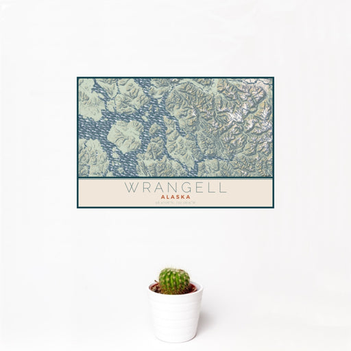 12x18 Wrangell Alaska Map Print Landscape Orientation in Woodblock Style With Small Cactus Plant in White Planter