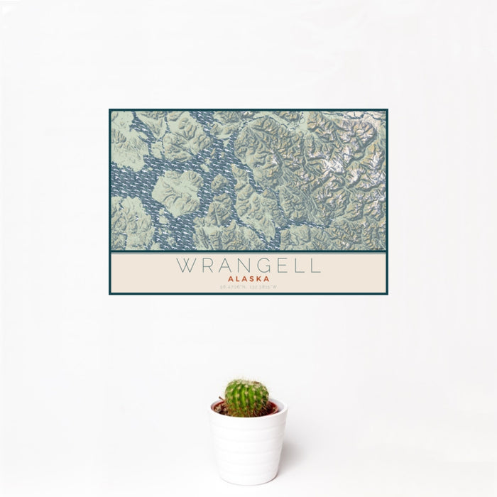 12x18 Wrangell Alaska Map Print Landscape Orientation in Woodblock Style With Small Cactus Plant in White Planter