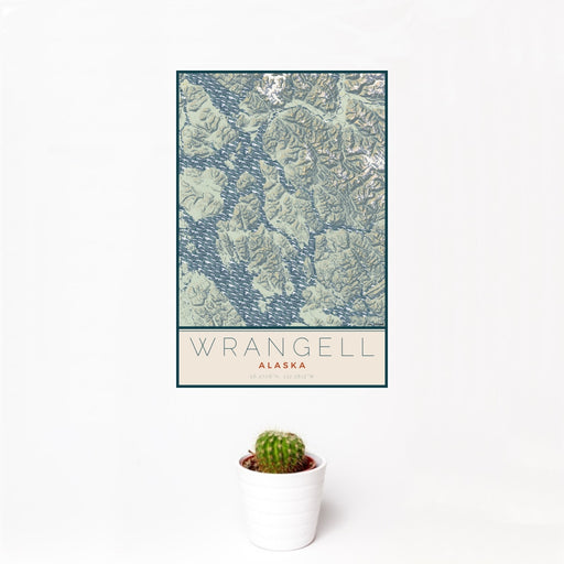 12x18 Wrangell Alaska Map Print Portrait Orientation in Woodblock Style With Small Cactus Plant in White Planter