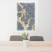 24x36 Wrangell Alaska Map Print Portrait Orientation in Afternoon Style Behind 2 Chairs Table and Potted Plant