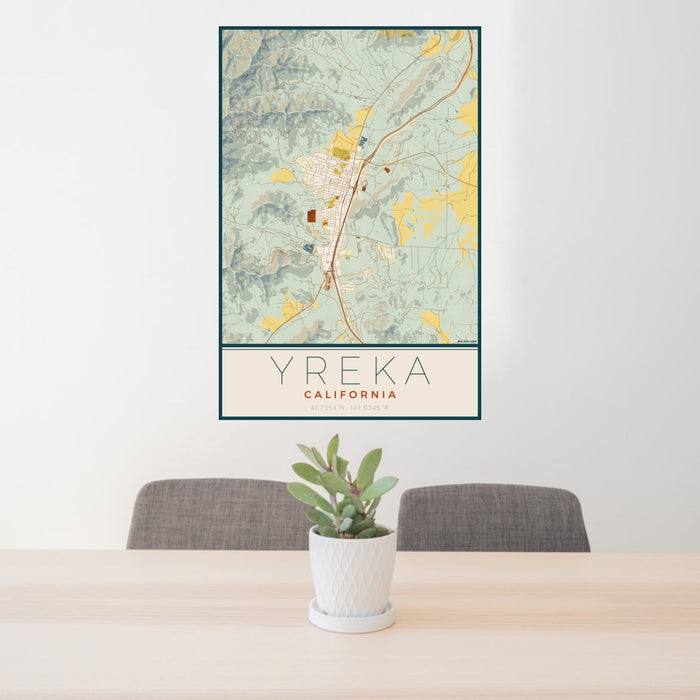 24x36 Yreka California Map Print Portrait Orientation in Woodblock Style Behind 2 Chairs Table and Potted Plant