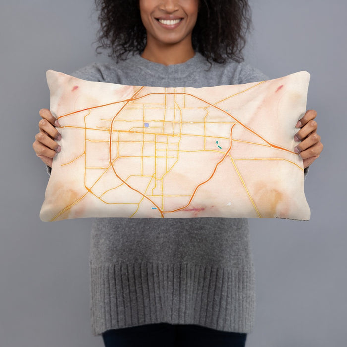 Person holding 20x12 Custom Abilene Texas Map Throw Pillow in Watercolor