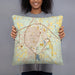 Person holding 18x18 Custom Abilene Texas Map Throw Pillow in Woodblock