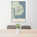 24x36 Acadia National Park Map Print Portrait Orientation in Woodblock Style Behind 2 Chairs Table and Potted Plant