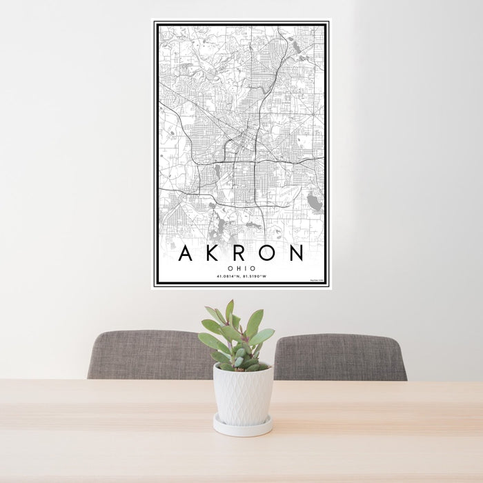 24x36 Akron Ohio Map Print Portrait Orientation in Classic Style Behind 2 Chairs Table and Potted Plant