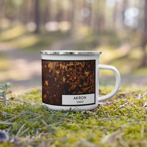 Right View Custom Akron Ohio Map Enamel Mug in Ember on Grass With Trees in Background