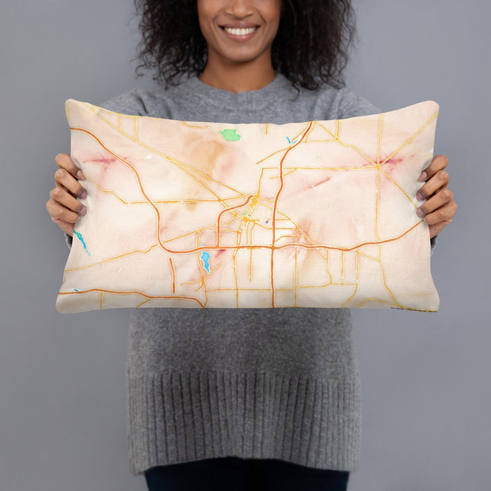 Person holding 20x12 Custom Akron Ohio Map Throw Pillow in Watercolor
