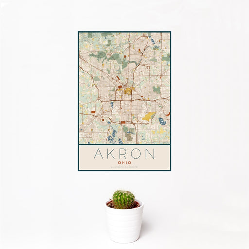 12x18 Akron Ohio Map Print Portrait Orientation in Woodblock Style With Small Cactus Plant in White Planter