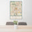 24x36 Akron Ohio Map Print Portrait Orientation in Woodblock Style Behind 2 Chairs Table and Potted Plant