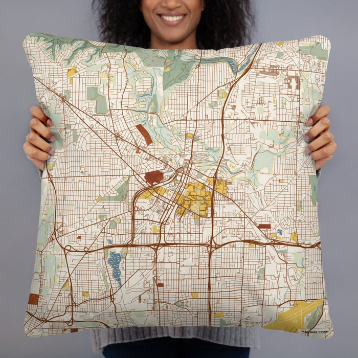 Person holding 22x22 Custom Akron Ohio Map Throw Pillow in Woodblock