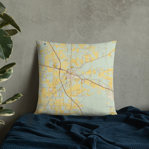 Custom Alachua Florida Map Throw Pillow in Woodblock on Bedding Against Wall