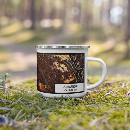 Right View Custom Alameda California Map Enamel Mug in Ember on Grass With Trees in Background