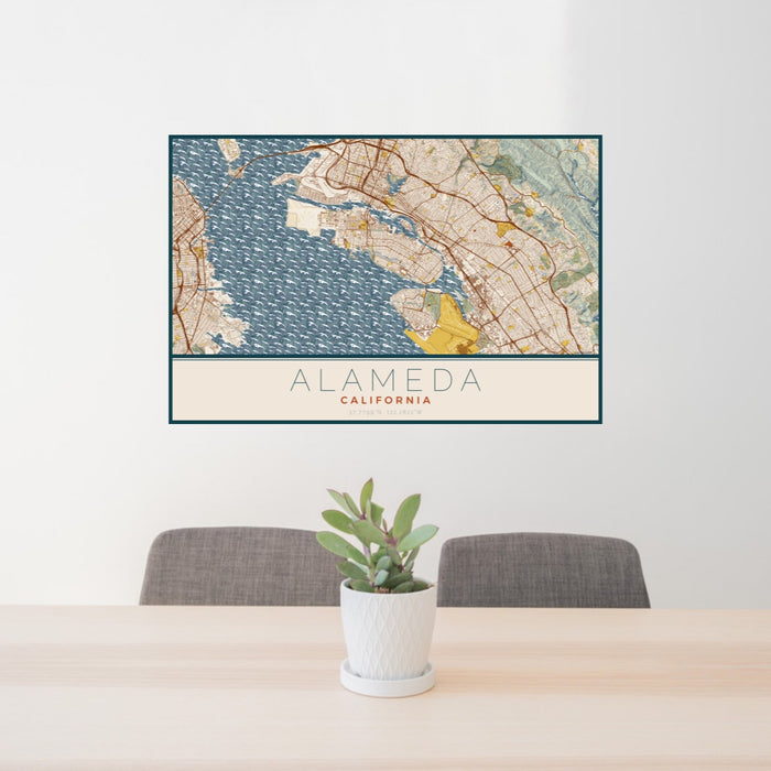 24x36 Alameda California Map Print Landscape Orientation in Woodblock Style Behind 2 Chairs Table and Potted Plant