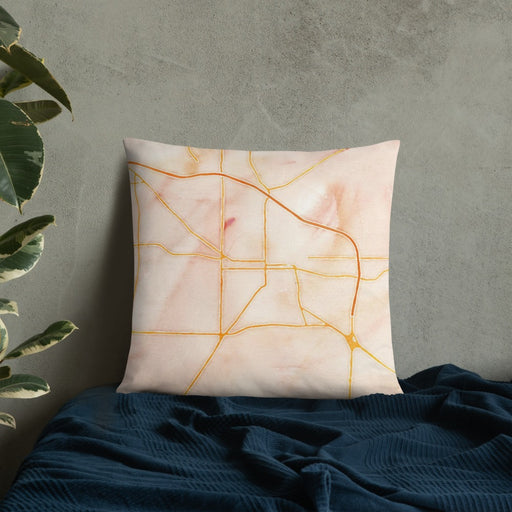 Custom Albany Georgia Map Throw Pillow in Watercolor on Bedding Against Wall