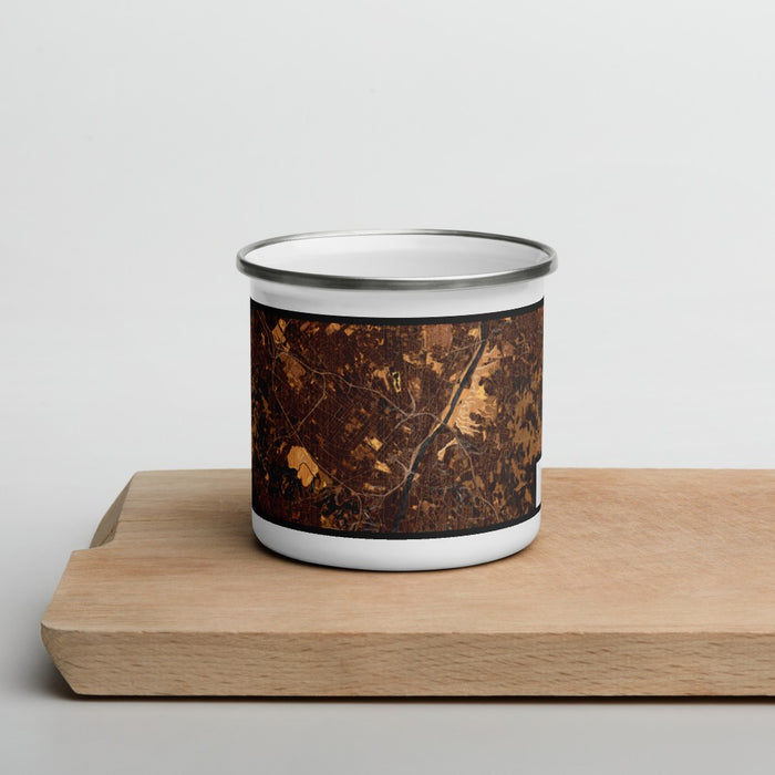 Front View Custom Albany New York Map Enamel Mug in Ember on Cutting Board