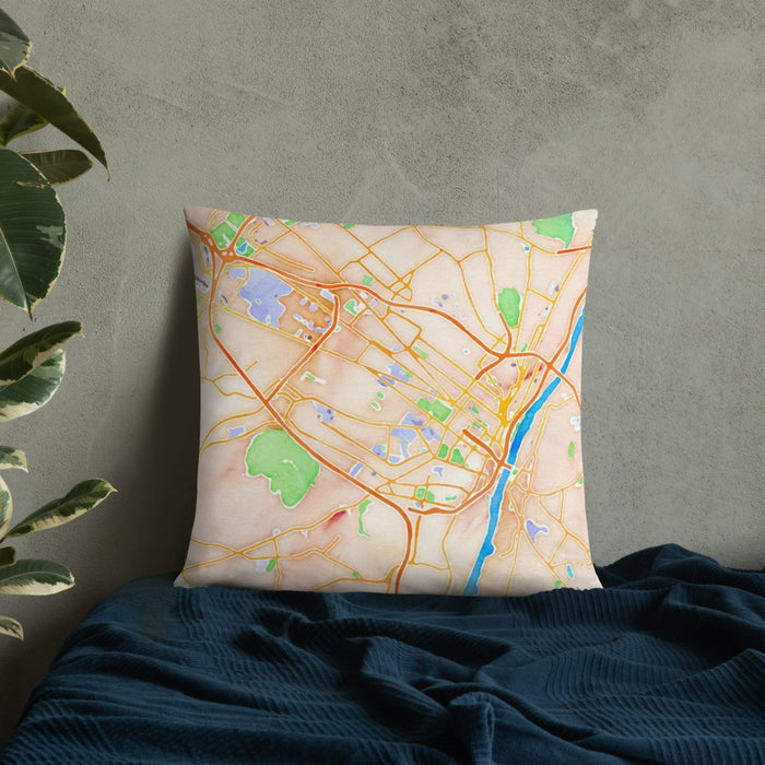 Custom Albany New York Map Throw Pillow in Watercolor on Bedding Against Wall