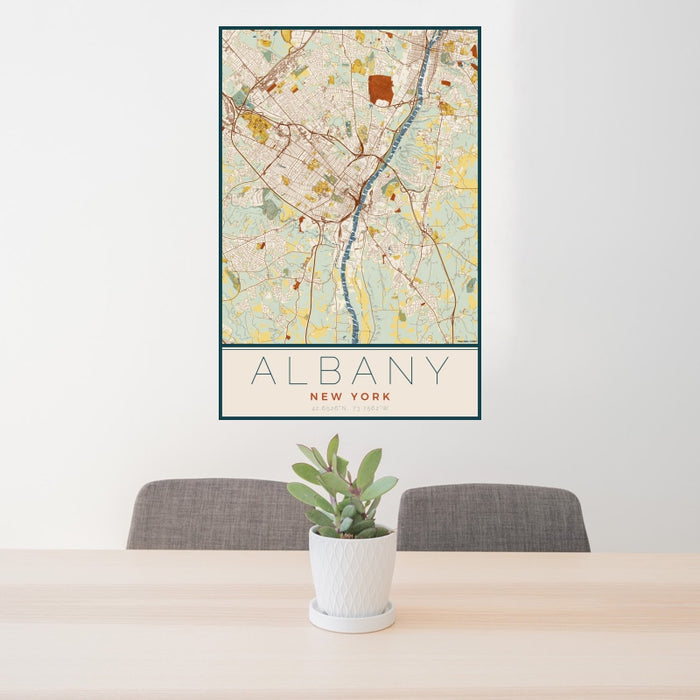 24x36 Albany New York Map Print Portrait Orientation in Woodblock Style Behind 2 Chairs Table and Potted Plant