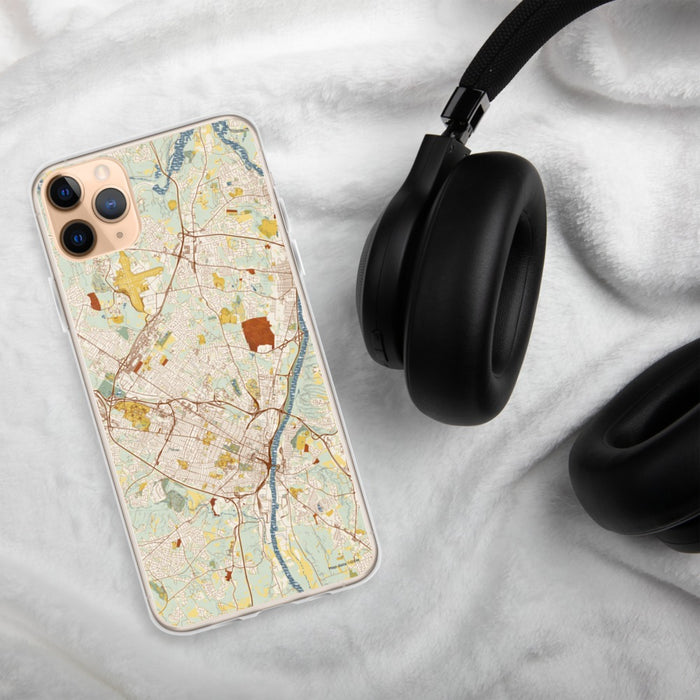 Custom Albany New York Map Phone Case in Woodblock on Table with Black Headphones
