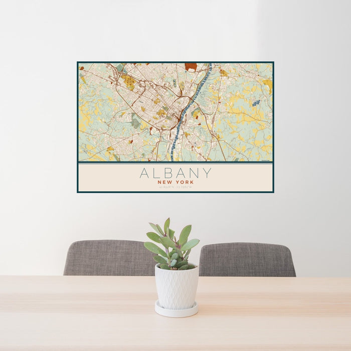 24x36 Albany New York Map Print Landscape Orientation in Woodblock Style Behind 2 Chairs Table and Potted Plant