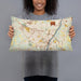 Person holding 20x12 Custom Albany New York Map Throw Pillow in Woodblock