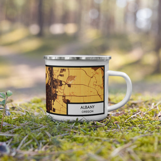Right View Custom Albany Oregon Map Enamel Mug in Ember on Grass With Trees in Background