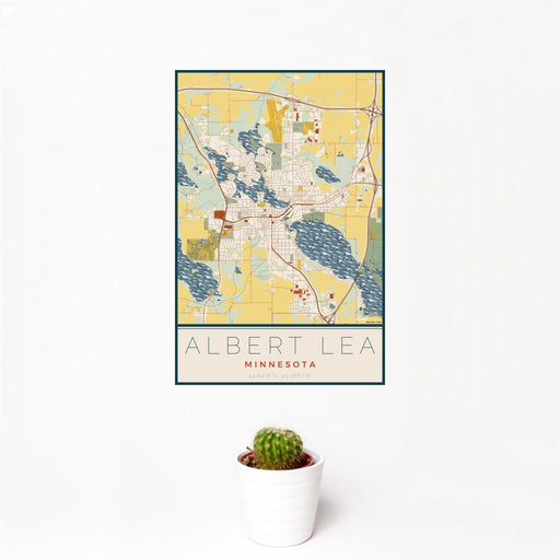 12x18 Albert Lea Minnesota Map Print Portrait Orientation in Woodblock Style With Small Cactus Plant in White Planter