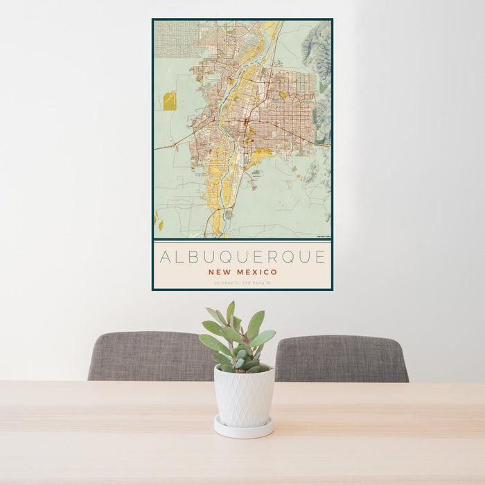 24x36 Albuquerque New Mexico Map Print Portrait Orientation in Woodblock Style Behind 2 Chairs Table and Potted Plant