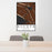 24x36 Alcova Wyoming Map Print Portrait Orientation in Ember Style Behind 2 Chairs Table and Potted Plant
