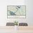 24x36 Alcova Wyoming Map Print Lanscape Orientation in Woodblock Style Behind 2 Chairs Table and Potted Plant