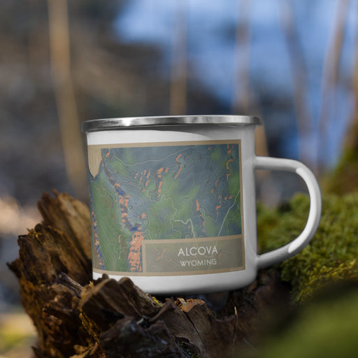 Right View Custom Alcova Wyoming Map Enamel Mug in Afternoon on Grass With Trees in Background