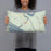 Person holding 20x12 Custom Alcova Wyoming Map Throw Pillow in Woodblock