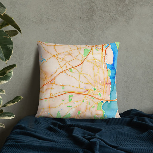 Custom Alexandria Virginia Map Throw Pillow in Watercolor on Bedding Against Wall