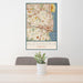 24x36 Alexandria Virginia Map Print Portrait Orientation in Woodblock Style Behind 2 Chairs Table and Potted Plant