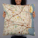 Person holding 22x22 Custom Alexandria Virginia Map Throw Pillow in Woodblock