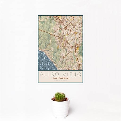 12x18 Aliso Viejo California Map Print Portrait Orientation in Woodblock Style With Small Cactus Plant in White Planter