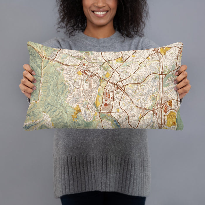 Person holding 20x12 Custom Aliso Viejo California Map Throw Pillow in Woodblock