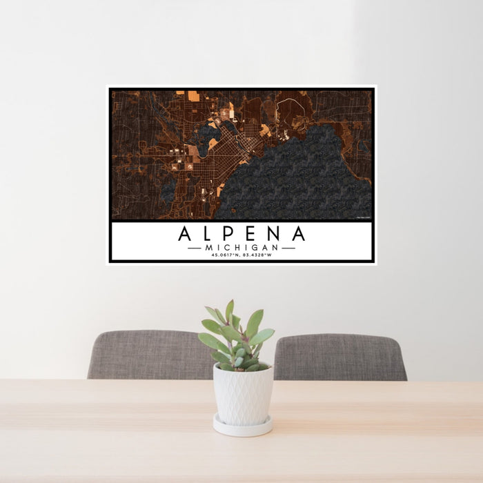 24x36 Alpena Michigan Map Print Lanscape Orientation in Ember Style Behind 2 Chairs Table and Potted Plant