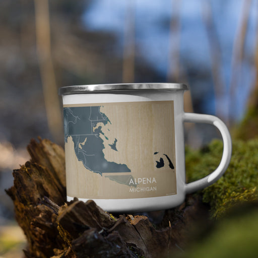 Right View Custom Alpena Michigan Map Enamel Mug in Afternoon on Grass With Trees in Background