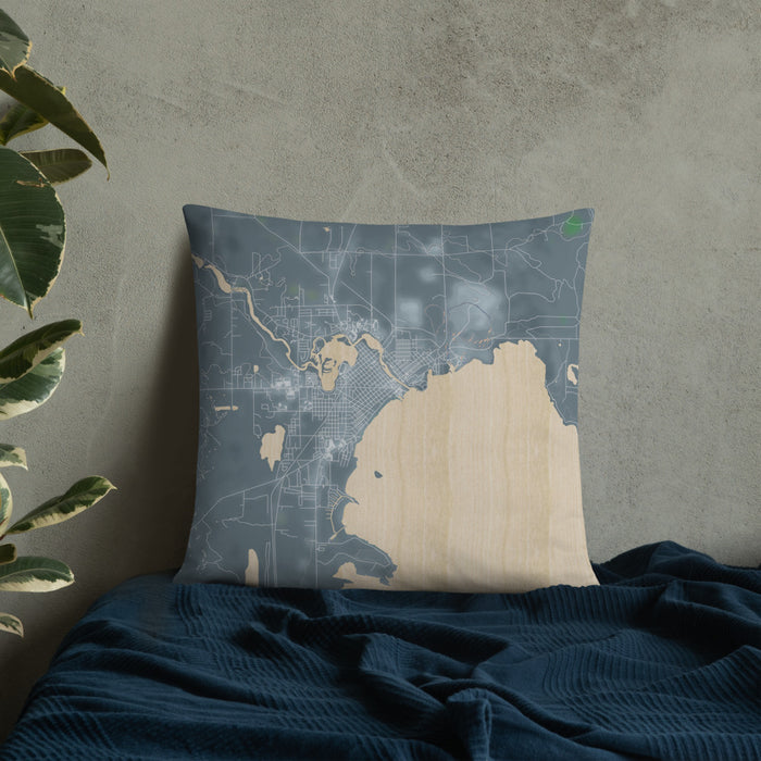 Custom Alpena Michigan Map Throw Pillow in Afternoon on Bedding Against Wall