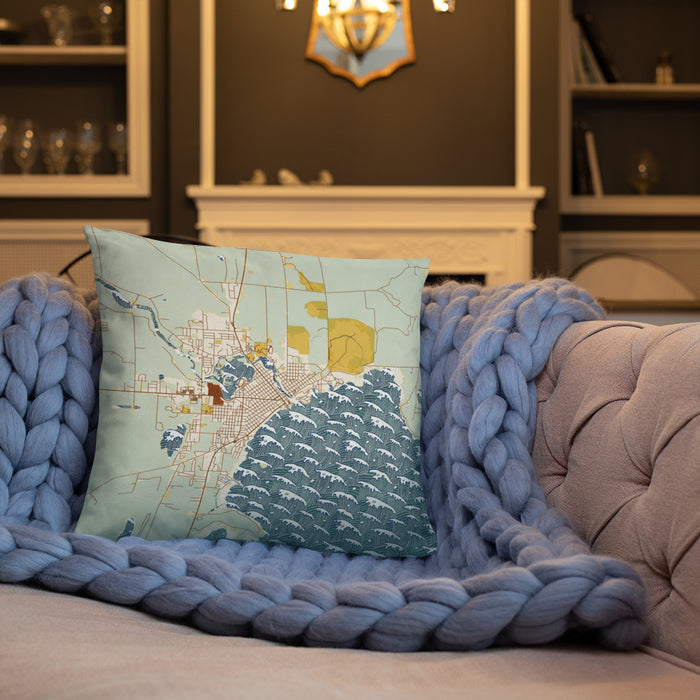 Custom Alpena Michigan Map Throw Pillow in Woodblock on Cream Colored Couch