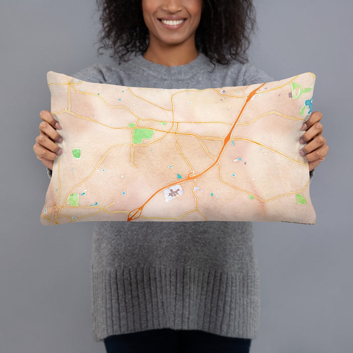 Person holding 20x12 Custom Alpharetta Georgia Map Throw Pillow in Watercolor
