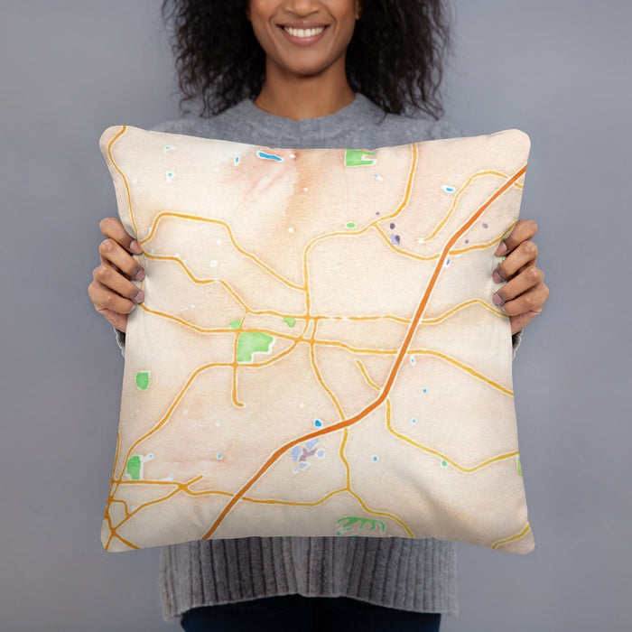 Person holding 18x18 Custom Alpharetta Georgia Map Throw Pillow in Watercolor